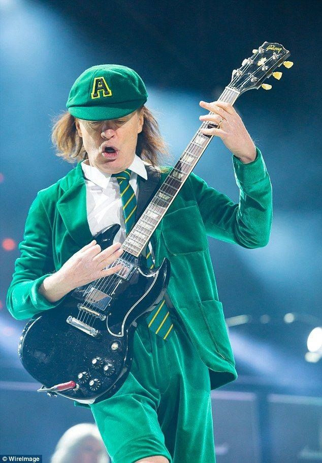 AC/DC Pop! Rocks: Angus Young Dancing on Stage in Green Tour Uniform